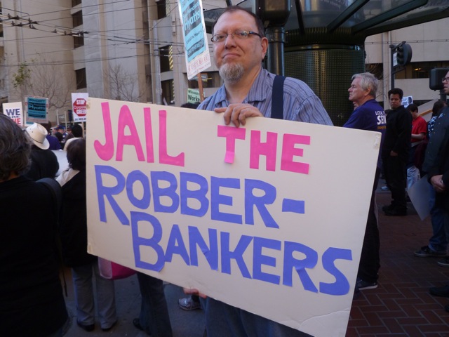 https://www.popularresistance.org/wp-content/uploads/2013/10/Bankers-should-go-to-jail.jpg